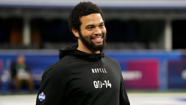 Former USC quarterback Caleb Williams smiles during the 2024 NFL Combine at Lucas Oil Stadium.